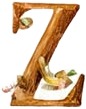 a wooden alphabet with a bird on it.jpg